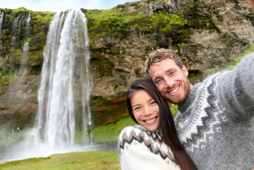 A couple wearing traditional Icelandic sweaters