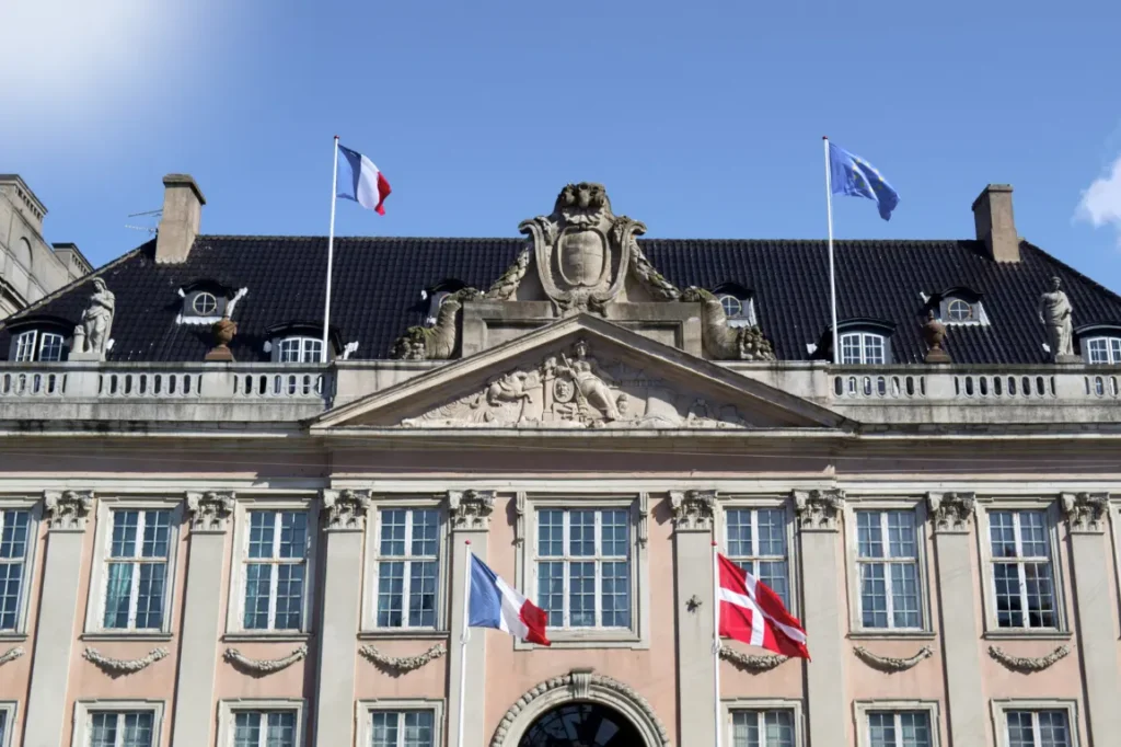 An embassy building on a sunny day