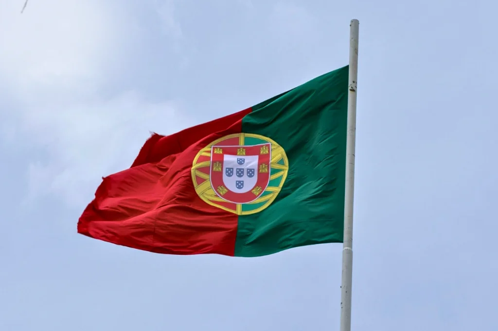 The flag for Portugal, blowing in the wind