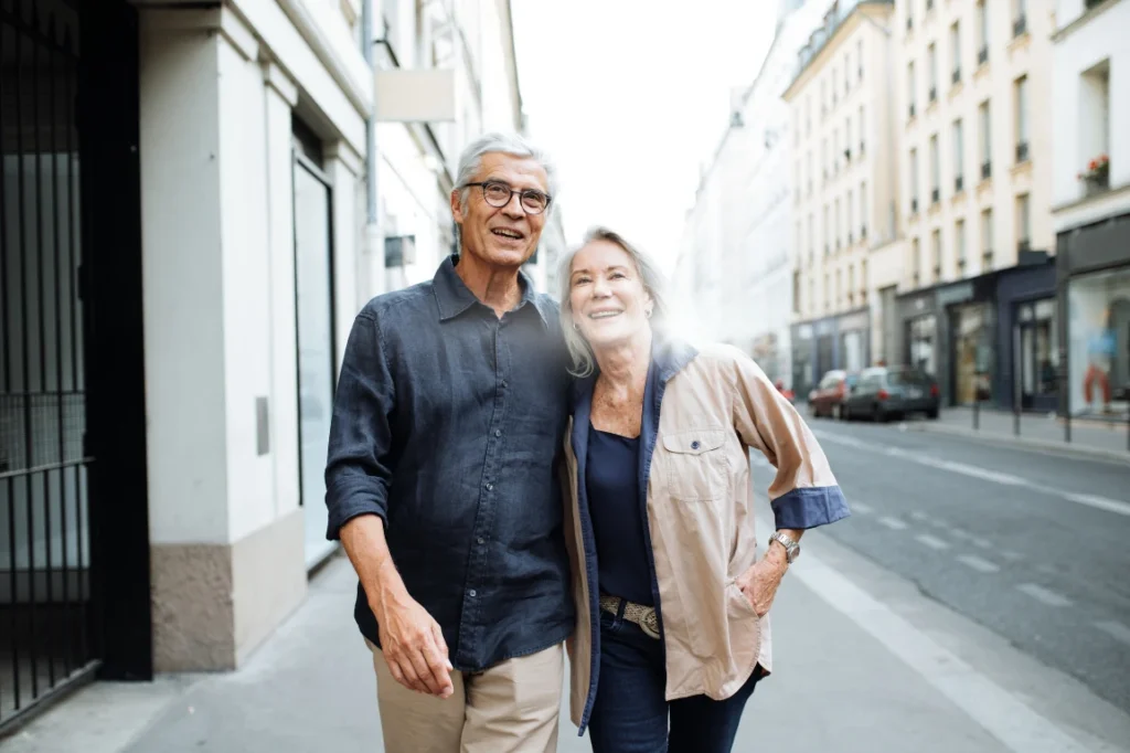 Senior couple in Europe, walking down the street
