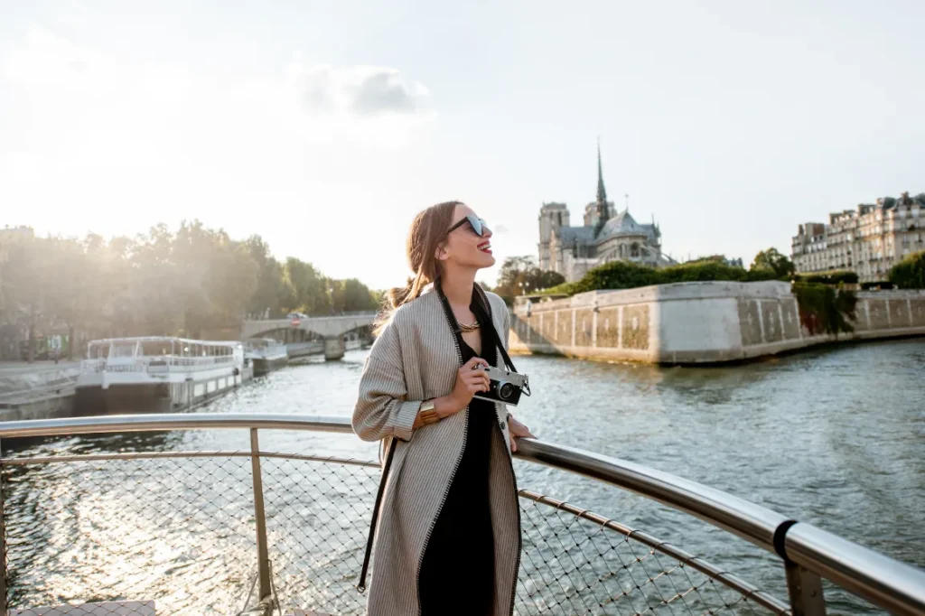 Woman tourist on a boat in Paris