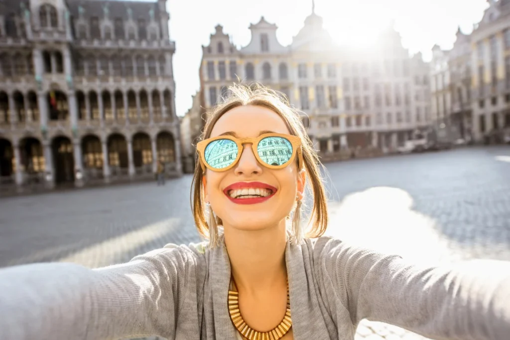 Female tourist taking a selfie in Belgium