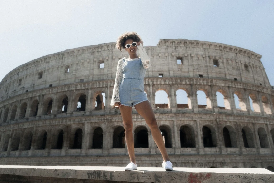 Woman in front of the Colosseum in Rome