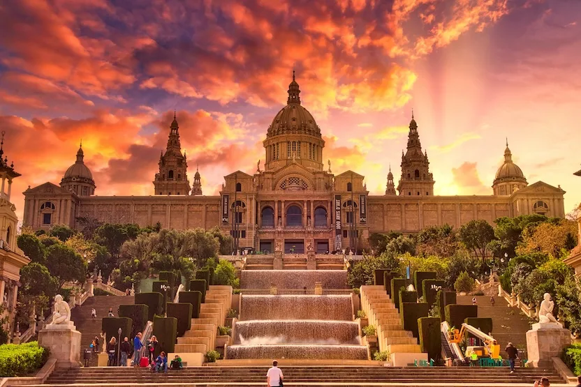 A beautiful building in Barcelona at sunset.