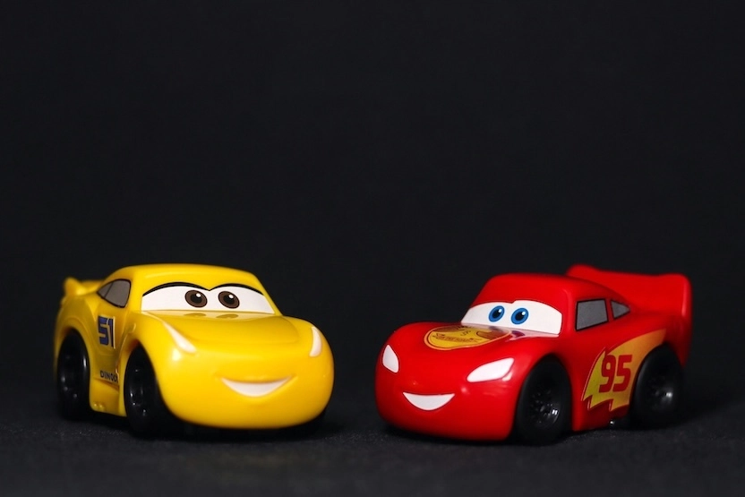 Two toy cars from the Disney film.