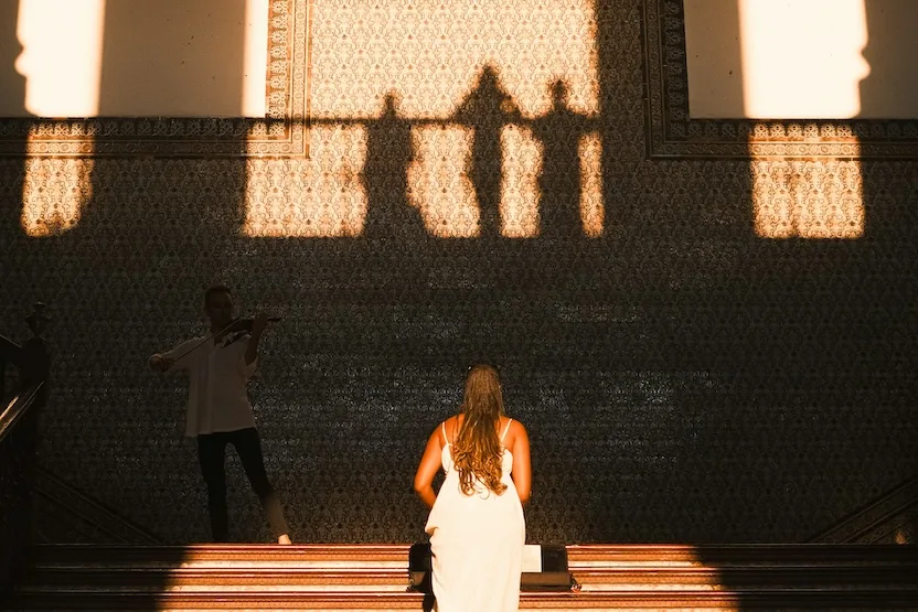 A woman exploring Moorish buildings in Southern Spain.