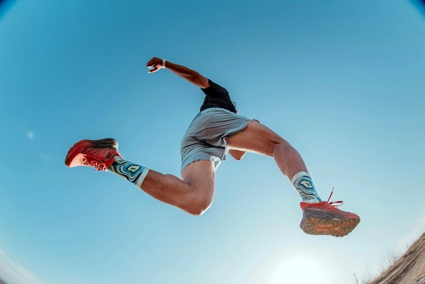 A man running, mid-stride.