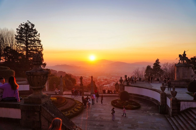 A pink, hazy sunset in Braga, Portugal