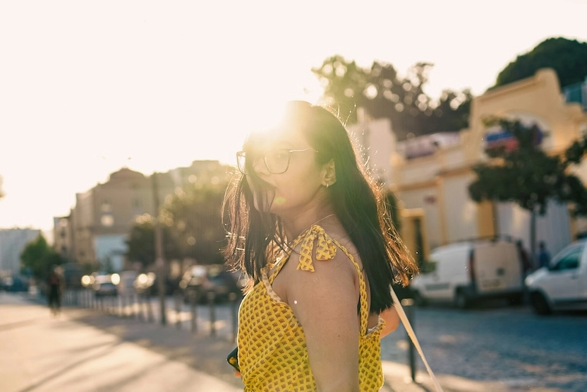 A female tourist in a yellow dress in Braga, Portugal