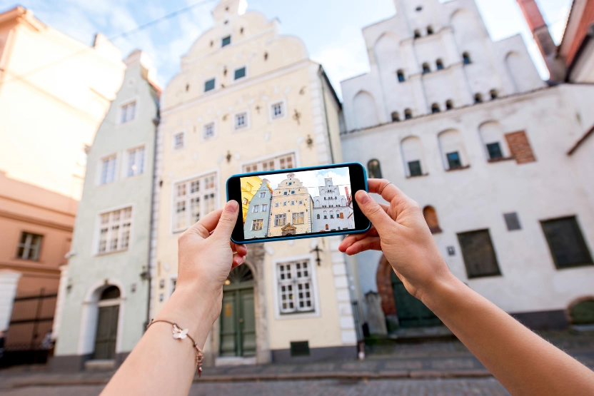 Taking a photo of buildings in Old Town Riga