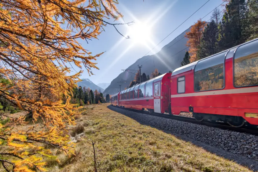 Red Swiss train in Autumn