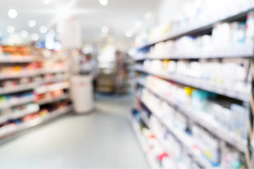 Blurred pharmacy shelves