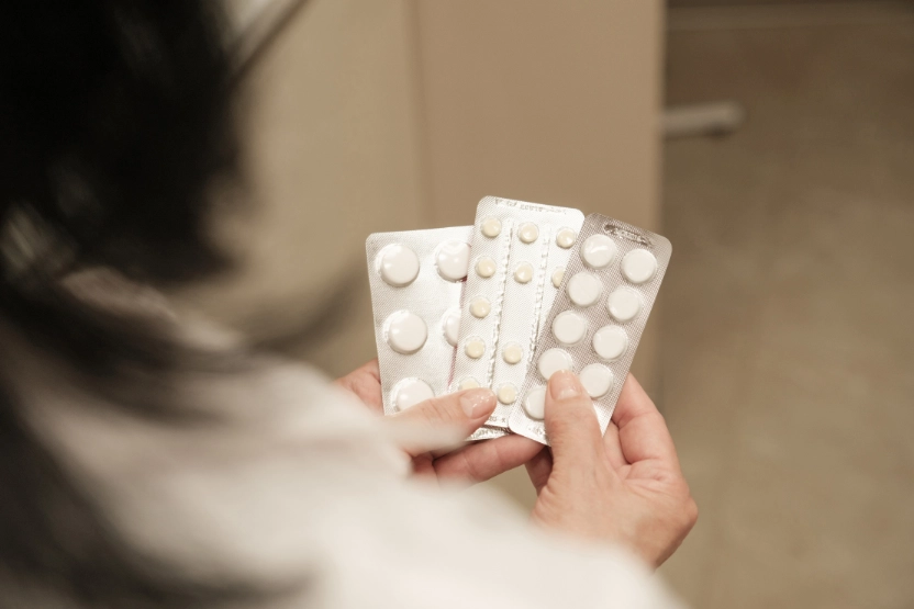 Woman holding medication
