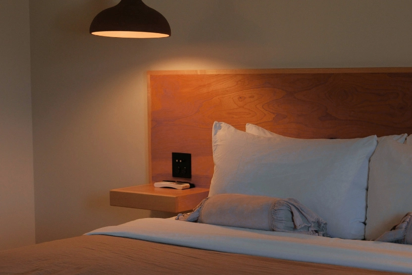 Hotel room interior, warmly lit